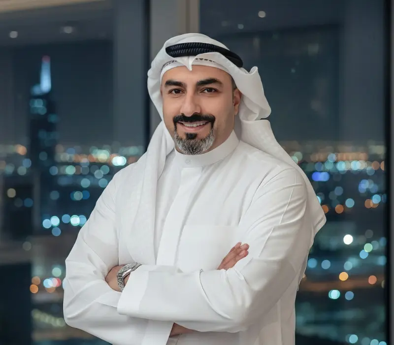 TALAL TAQI attorney Dr Talal Taqi, Corporate Litigation Expert in Kuwait standing in al-dostour law firm kuwait office ، محامي كويتي في شركة الدستور للمحاماة , محامي شركات في الكويت - مكتب الدستور